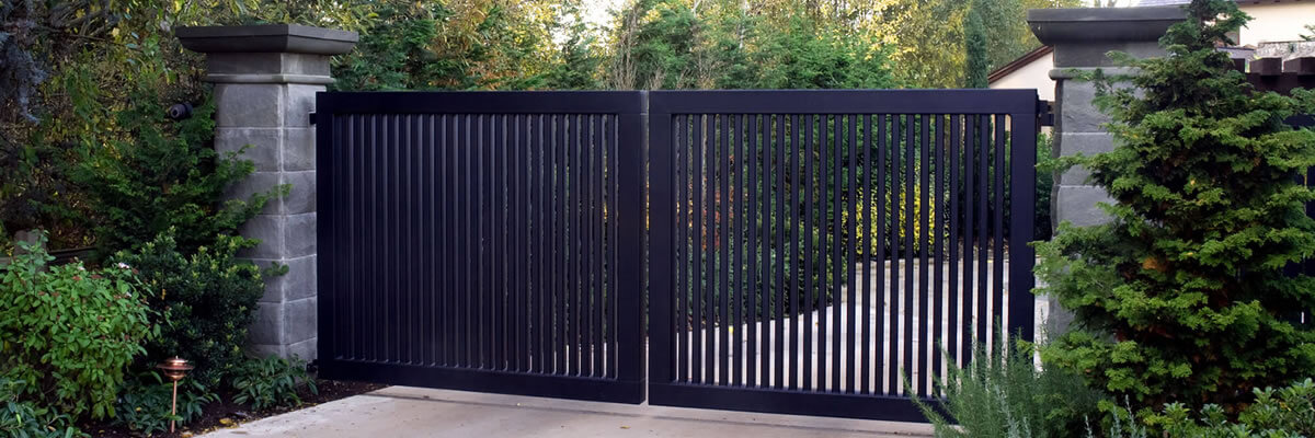 Residential Double Swing Iron Driveway Gate With Louvered Panels And Matte Black Finish