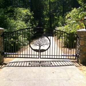 Double Swing Gate with River Rock Pillars