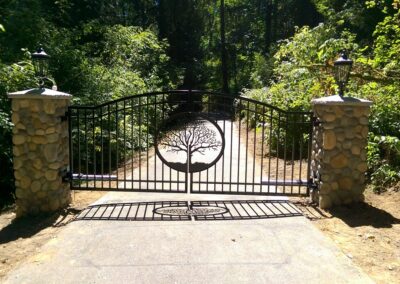 Double Swing Gate with River Rock Pillars