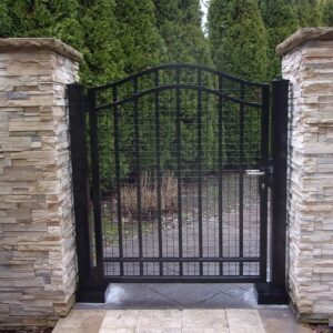 Residential Pedestrian Swing Gate With Stacked Stone Pillars