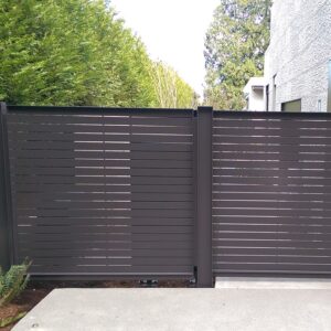 Sleek, Cantilever Pedestrian Slide Gate That Retracts Behind A Matching Fence