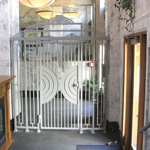 Artistic Yet Secure, Custom Walkway Gate With Pickets And Custom Steel Panel Infill