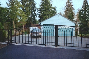 Iron Slide Gate with Arched Pickets