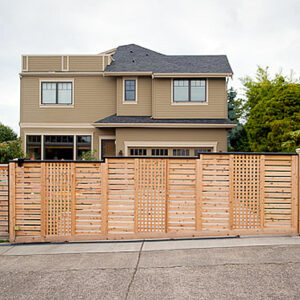 Sloped Iron Slide Gate with Horiztonal Wood Slats and Wood Mesh
