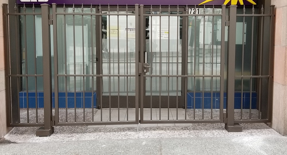 Urban Business With A Commercial Pedestrian Double Swing Gate For Needed Security Urban Business With A Commercial Pedestrian Double Swing Gate For Needed Security