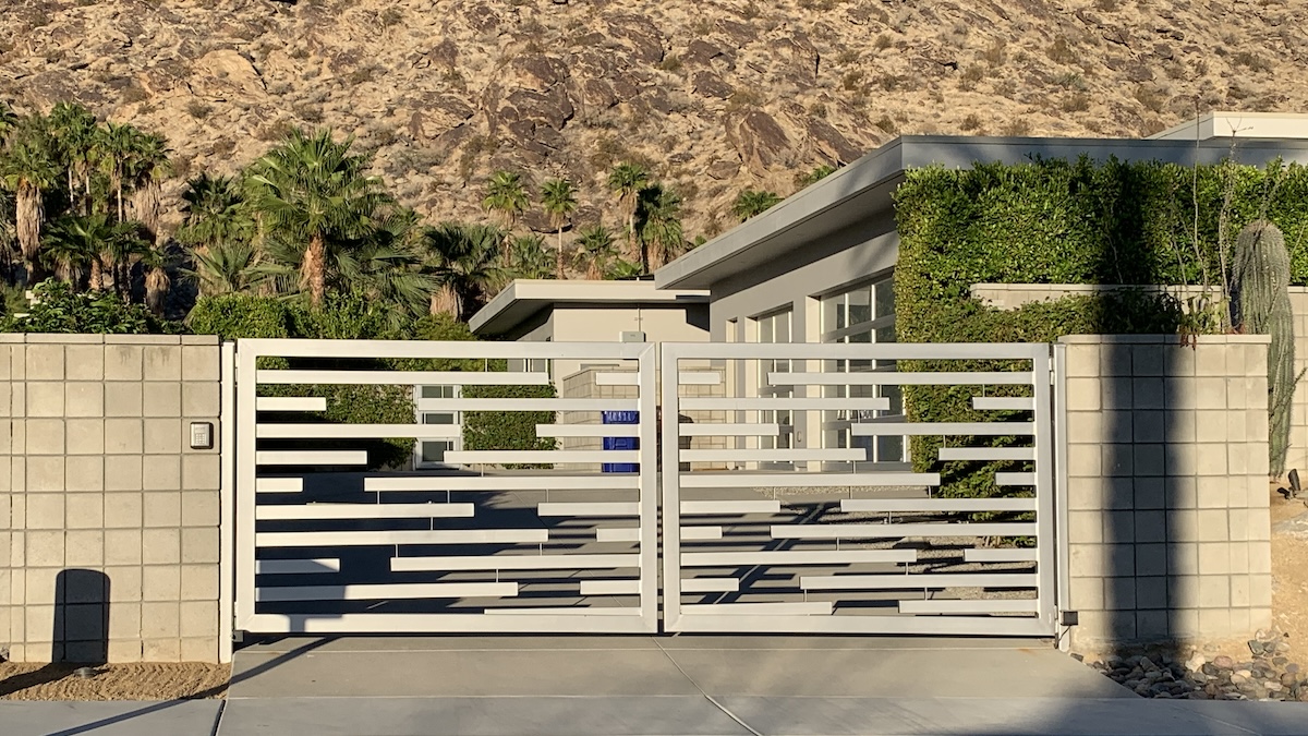 Modern, Custom Automatic Metal Swing Gate Enhances The Beauty And Value Of Your Home