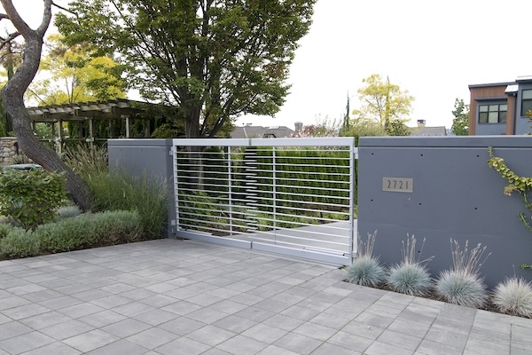Residential Modern Driveway Gate With Double Swing Movement And Horizontal Steel Pickets