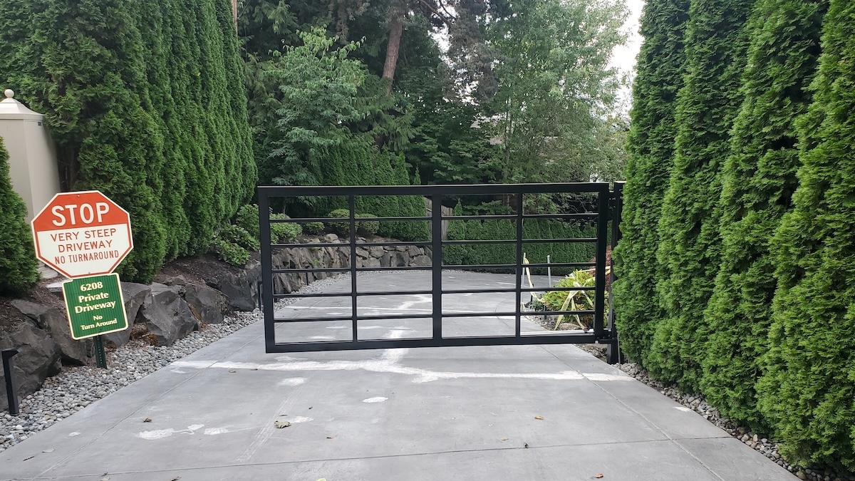 Bellevue Rails To Trails Impacted Driveway After Automated Steel Swing Gate Installation