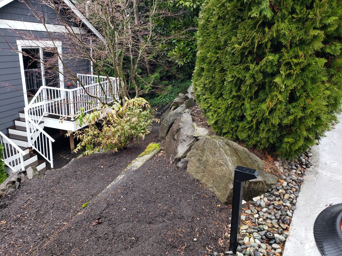 Bellevue Rails To Trails Impacted Driveway Beside A Steep Hill