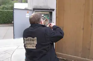 Gate Technician Servicing the Electronics