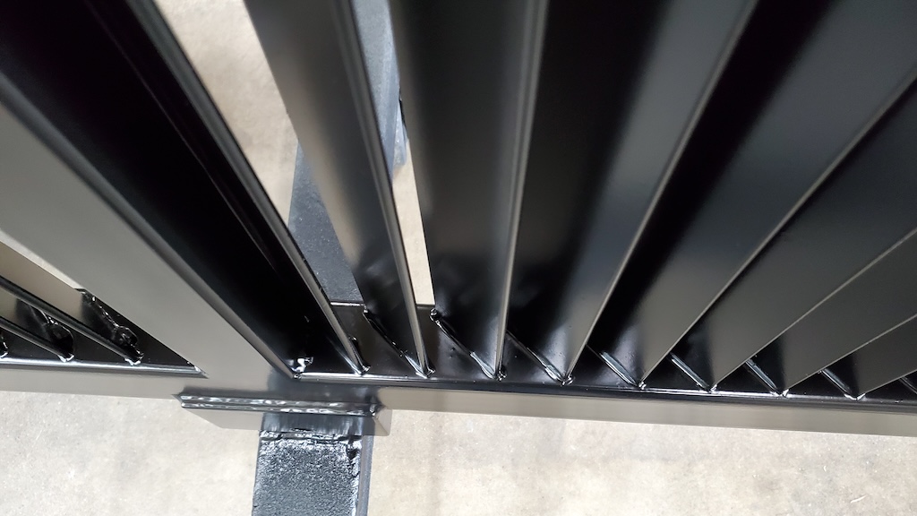 Louvered Metal Slide Gate Slat Welds Residential Driveway Louvered Metal Slide Gate With Welded Vertical Slats And Black Finish