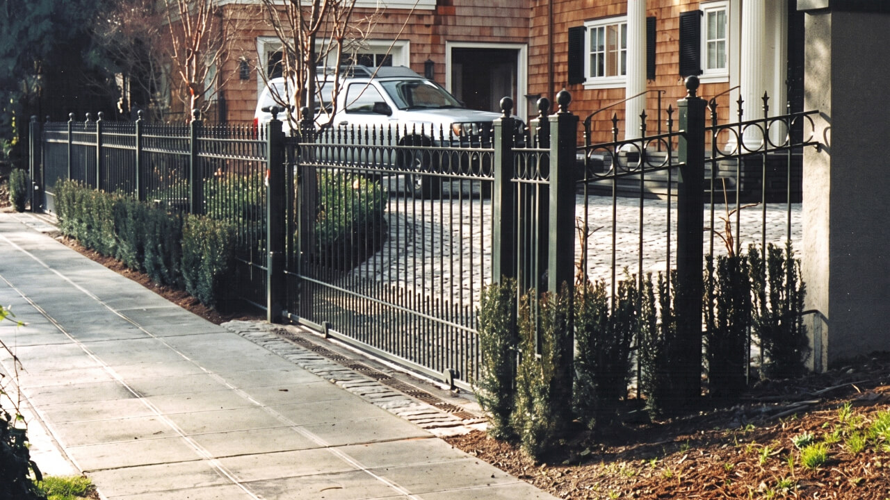 Custom Fabricated Wrought Iron Fencing and Matching Entry Gate Custom Fabricated Wrought Iron Fencing and Matching Entry Gate